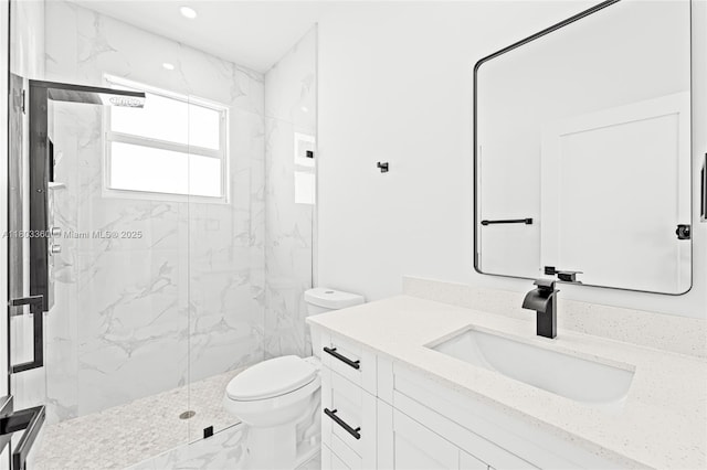2506 5th St SW, Lehigh Acres, FL 33976 - bathroom featuring toilet, a marble finish shower, vanity, and marble finish flooring