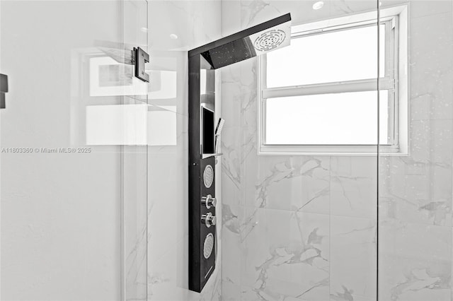2506 5th St SW, Lehigh Acres, FL 33976 - bathroom with a marble finish shower