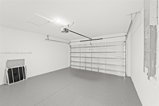 2506 5th St SW, Lehigh Acres, FL 33976 - garage featuring a garage door opener