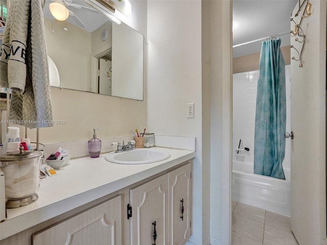 3113 S Ocean Dr Unit 603, Hallandale Beach, FL 33009 - full bathroom featuring a ceiling fan, vanity, tile patterned floors, and shower / bath combo with shower curtain
