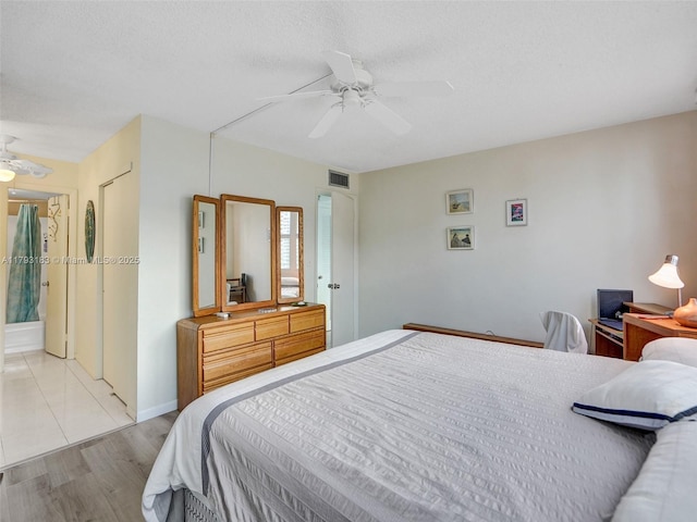 3113 S Ocean Dr Unit 603, Hallandale Beach, FL 33009 - bedroom featuring ceiling fan, baseboards, and light wood-style floors