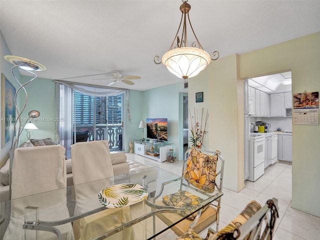 3113 S Ocean Dr Unit 603, Hallandale Beach, FL 33009 - dining room with a ceiling fan and light tile patterned floors
