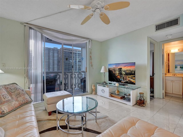 3113 S Ocean Dr Unit 603, Hallandale Beach, FL 33009 - living area with a ceiling fan