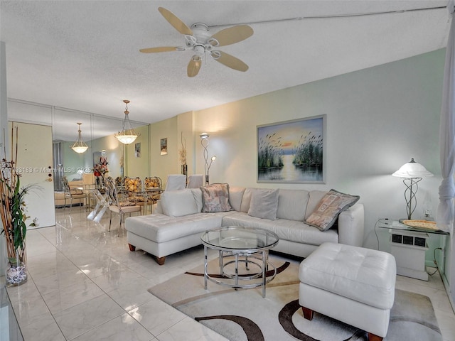 3113 S Ocean Dr Unit 603, Hallandale Beach, FL 33009 - living room with ceiling fan, light marble finish floors, and a textured ceiling