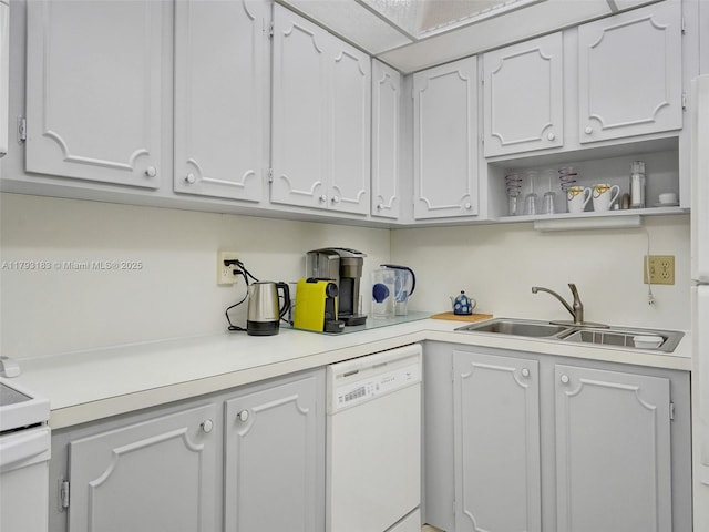 3113 S Ocean Dr Unit 603, Hallandale Beach, FL 33009 - kitchen with white appliances, a sink, light countertops, and open shelves