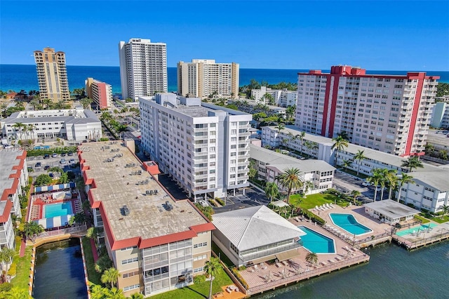 3113 S Ocean Dr Unit 603, Hallandale Beach, FL 33009 - view of urban area featuring a nearby body of water and a pool area