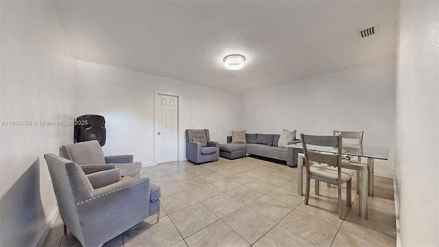 18502 NW 23rd Ct, Miami Gardens, FL 33056 - living room with light tile patterned floors