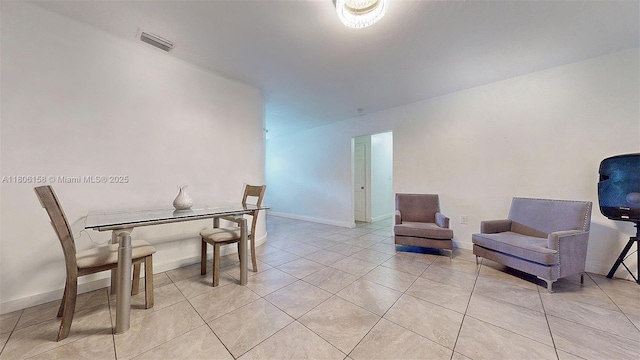 18502 NW 23rd Ct, Miami Gardens, FL 33056 - dining room with light tile patterned flooring and baseboards