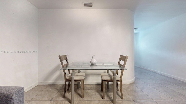 18502 NW 23rd Ct, Miami Gardens, FL 33056 - dining space featuring light tile patterned floors