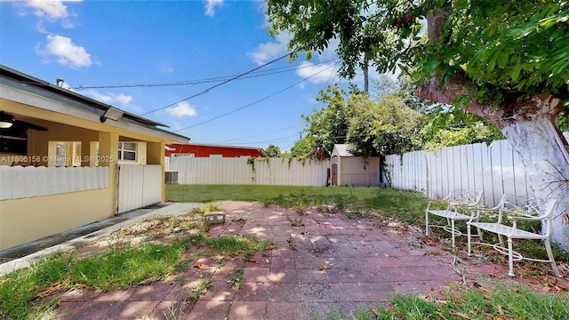 18502 NW 23rd Ct, Miami Gardens, FL 33056 - view of yard featuring a patio and a storage shed