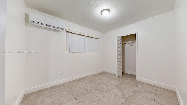 18502 NW 23rd Ct, Miami Gardens, FL 33056 - unfurnished bedroom featuring a wall mounted AC and a closet