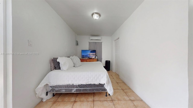 18502 NW 23rd Ct, Miami Gardens, FL 33056 - bedroom with a wall mounted AC, tile patterned flooring, and a closet
