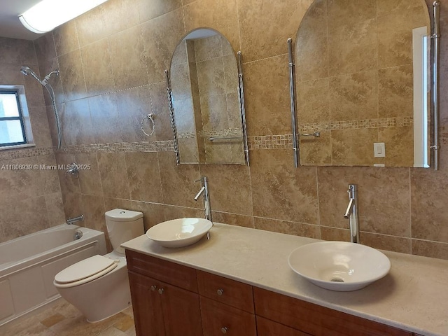 20033 NE 2nd Pl, Miami, FL 33179 - full bath featuring tile walls,  shower combination, toilet, and double vanity