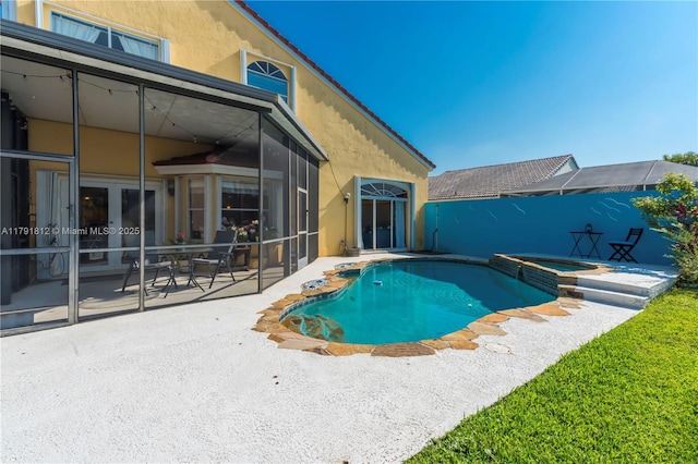 1060 NW 192nd Ave, Pembroke Pines, FL 33029 - view of pool with a patio area, a pool with connected hot tub, and french doors
