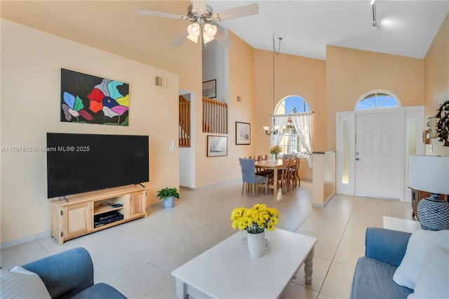 1060 NW 192nd Ave, Pembroke Pines, FL 33029 - living area with high vaulted ceiling, a ceiling fan, baseboards, track lighting, and light tile patterned flooring