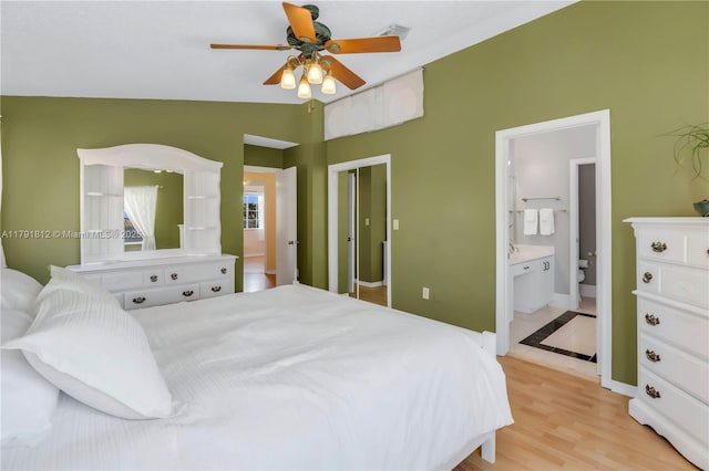 1060 NW 192nd Ave, Pembroke Pines, FL 33029 - bedroom with ensuite bath, light wood finished floors, and ceiling fan