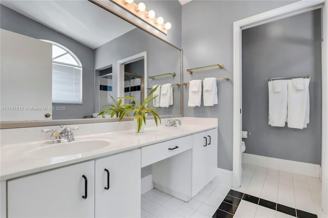 1060 NW 192nd Ave, Pembroke Pines, FL 33029 - full bathroom with tile patterned flooring, toilet, double vanity, baseboards, and curtained shower