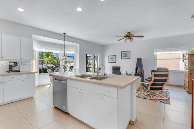 1060 NW 192nd Ave, Pembroke Pines, FL 33029 - kitchen featuring stainless steel dishwasher, a sink, plenty of natural light, a ceiling fan, and recessed lighting