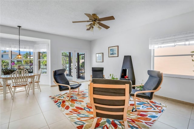 1060 NW 192nd Ave, Pembroke Pines, FL 33029 - home office with ceiling fan, light tile patterned flooring, french doors, and baseboards