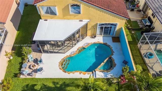 1060 NW 192nd Ave, Pembroke Pines, FL 33029 - rear view of property with stucco siding and a patio area
