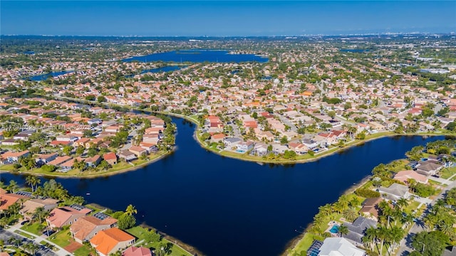 1060 NW 192nd Ave, Pembroke Pines, FL 33029 - aerial view of property and surrounding area featuring nearby suburban area and a nearby body of water
