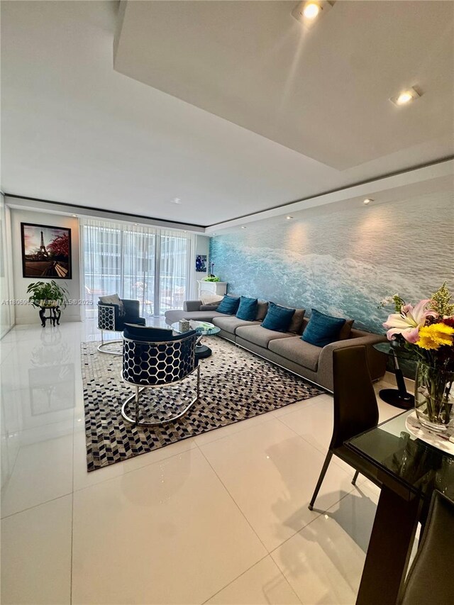 9801 Collins Ave Unit 19J, Bal Harbour, FL 33154 - tiled living room with a wall of windows