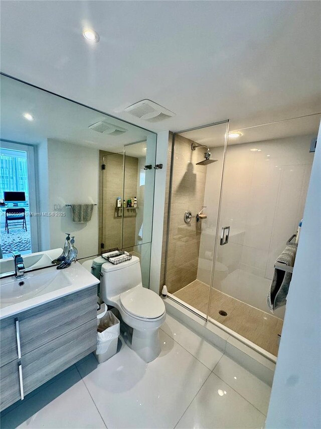 9801 Collins Ave Unit 19J, Bal Harbour, FL 33154 - full bathroom with tile patterned flooring, toilet, a shower stall, vanity, and recessed lighting