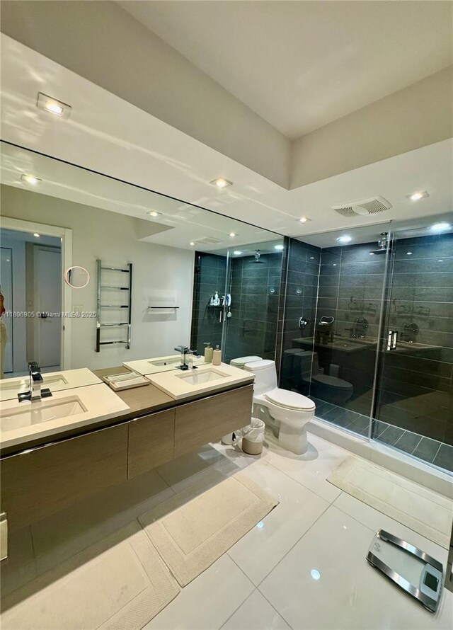 9801 Collins Ave Unit 19J, Bal Harbour, FL 33154 - full bathroom with tile patterned floors, toilet, a shower stall, double vanity, and recessed lighting