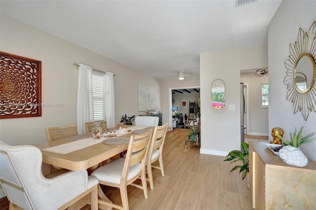 1222 14th Ct S, Lake Worth, FL 33460 - dining space with light wood-style floors, a ceiling fan, and baseboards