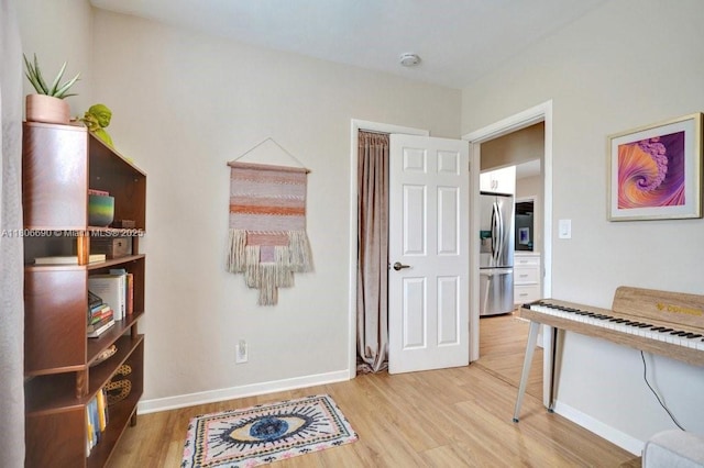 1222 S 14th Ct S, Lake Worth, FL 33460 - office with light wood-style floors and baseboards