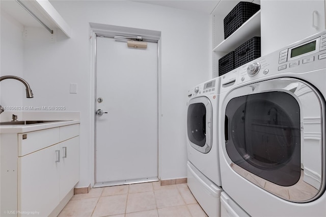 13637 Deering Bay Dr Unit 231, Coral Gables, FL 33158 - laundry area with washer and dryer, a sink, baseboards, and light tile patterned floors
