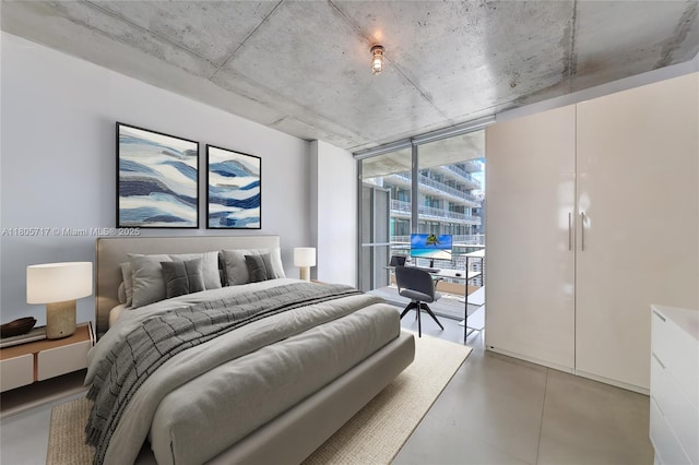 690 SW 1st Ct Unit 2109, Miami, FL 33130 - bedroom featuring access to exterior, floor to ceiling windows, and an office area