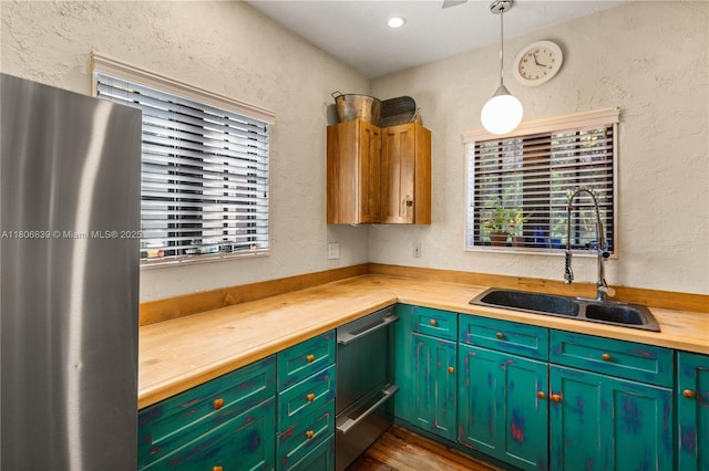 1510 Madrid St, Coral Gables, FL 33134 - kitchen featuring a sink, butcher block countertops, freestanding refrigerator, dishwasher, and dark wood-style flooring