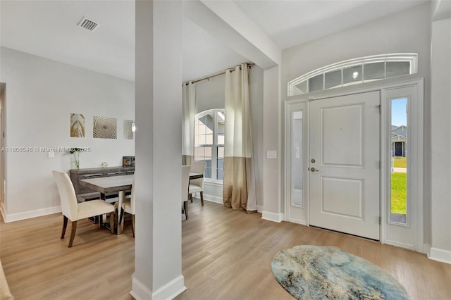 2316 SW Santana Ave, Port St Lucie, FL 34953 - foyer with light wood-type flooring and baseboards