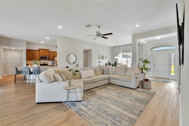 2316 SW Santana Ave, Port St Lucie, FL 34953 - living area featuring light wood-type flooring, a ceiling fan, and recessed lighting