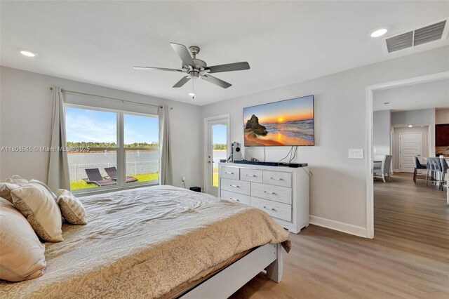 2316 SW Santana Ave, Port St Lucie, FL 34953 - bedroom featuring light wood-style flooring, baseboards, recessed lighting, and a ceiling fan