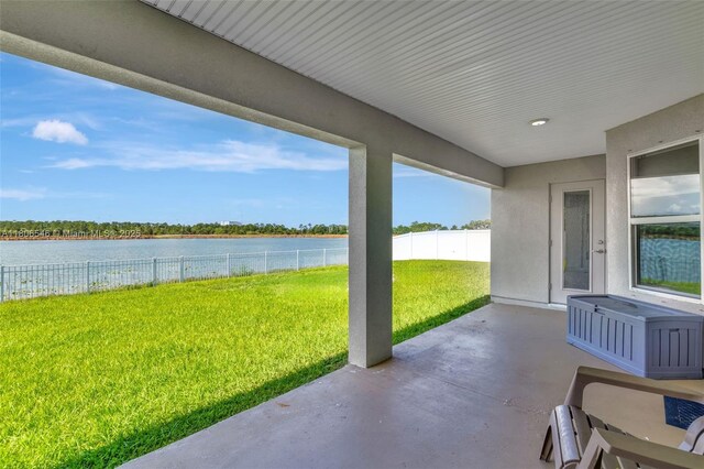 2316 SW Santana Ave, Port St Lucie, FL 34953 - view of patio / terrace featuring a water view