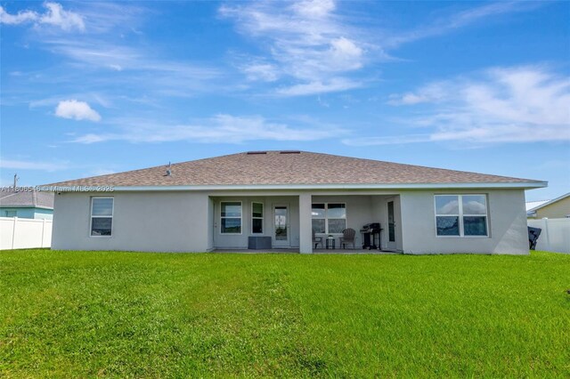 2316 SW Santana Ave, Port St Lucie, FL 34953 - rear view of property featuring stucco siding and roof with shingles