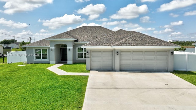2316 SW Santana Ave, Port St Lucie, FL 34953 - view of front of property with a shingled roof, stucco siding, an attached garage, and concrete driveway