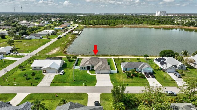 2316 SW Santana Ave, Port St Lucie, FL 34953 - aerial view of residential area featuring a nearby body of water