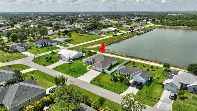2316 SW Santana Ave, Port St Lucie, FL 34953 - aerial view of residential area with a large body of water