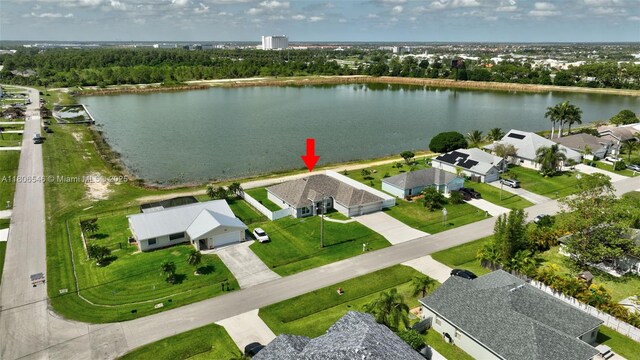 2316 SW Santana Ave, Port St Lucie, FL 34953 - aerial perspective of suburban area featuring a large body of water