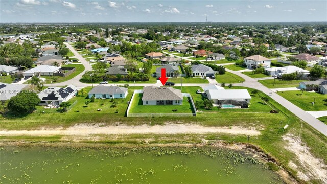 2316 SW Santana Ave, Port St Lucie, FL 34953 - aerial view of residential area featuring a large body of water