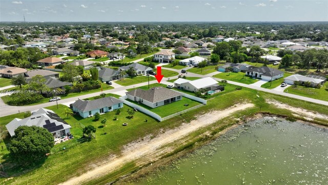 2316 SW Santana Ave, Port St Lucie, FL 34953 - aerial view of residential area featuring a nearby body of water