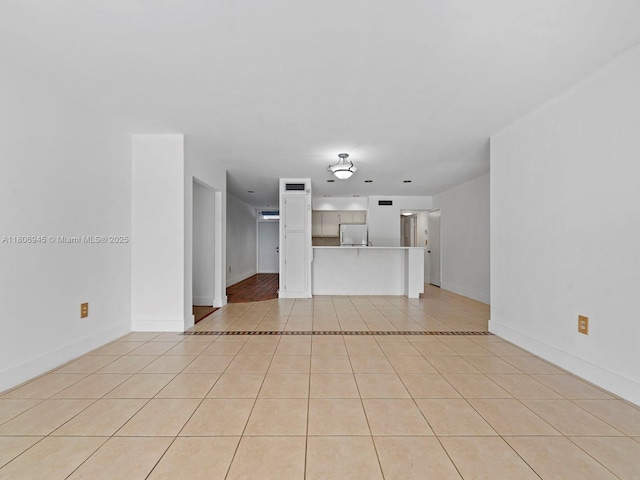 16380 Briar Patch Pl, Miami Lakes, FL 33014 - unfurnished living room featuring light tile patterned floors and baseboards
