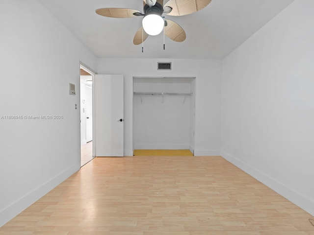 16380 Briar Patch Pl, Miami Lakes, FL 33014 - unfurnished bedroom with light wood-style flooring, a closet, and a ceiling fan