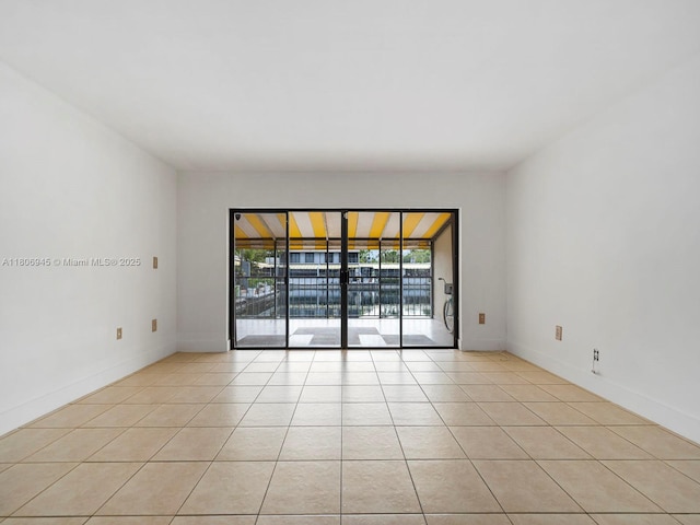 16380 Briar Patch Pl, Miami Lakes, FL 33014 - unfurnished room with light tile patterned floors and baseboards