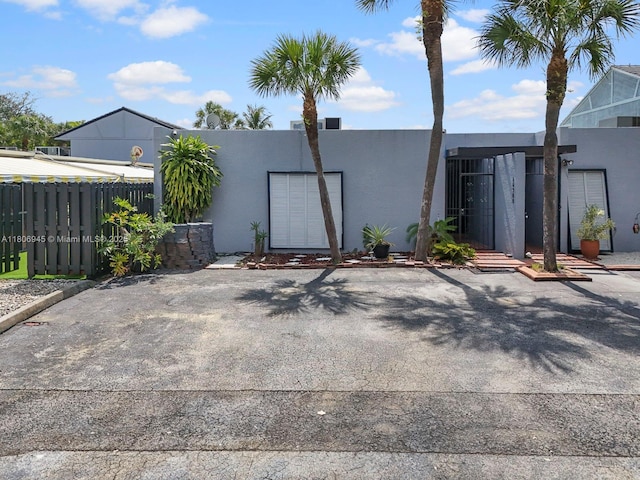 16380 Briar Patch Pl, Miami Lakes, FL 33014 - back of property with stucco siding