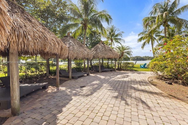 2641 N Flamingo Rd Unit 2408N, Sunrise, FL 33323 - view of property's community with a gazebo, a patio, and a water view