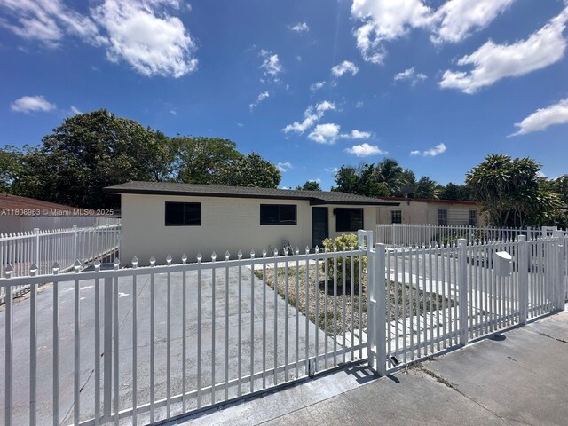 732 Burlington St, Opa-Locka, FL 33054 - single story home featuring a fenced front yard